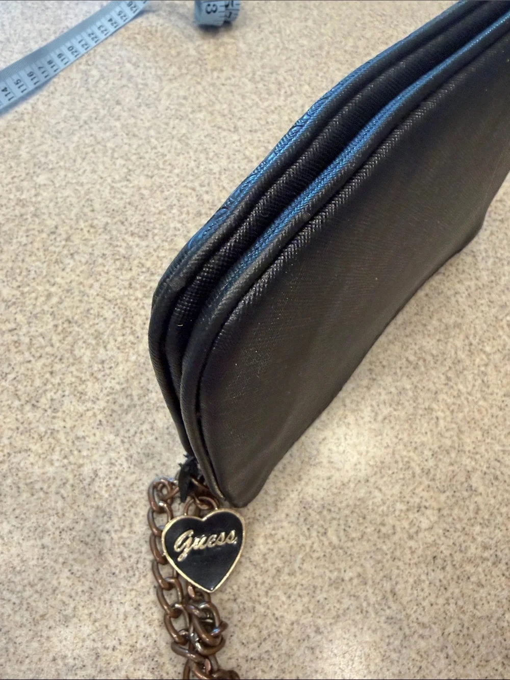 Guess Black Embossed Signature Wristlet with Chain and Heart Charm
